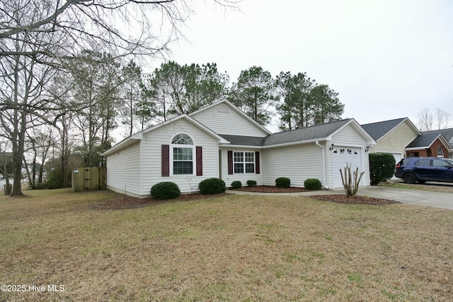 view of front facade featuring a garage and a front lawn