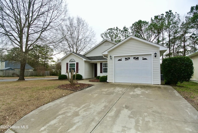 view of front facade with a garage and a front yard