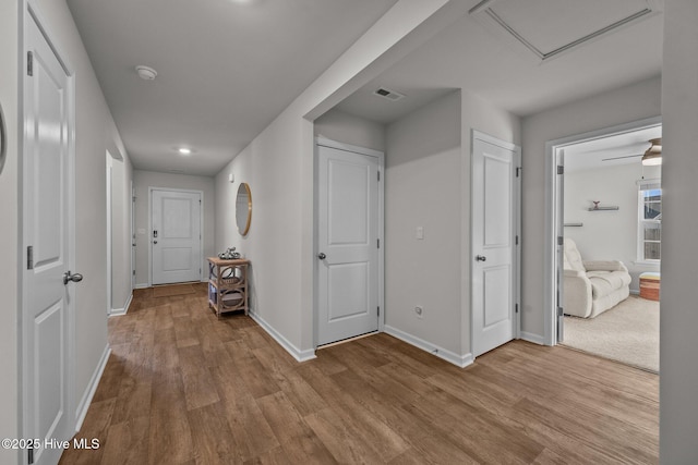 corridor featuring light wood-type flooring