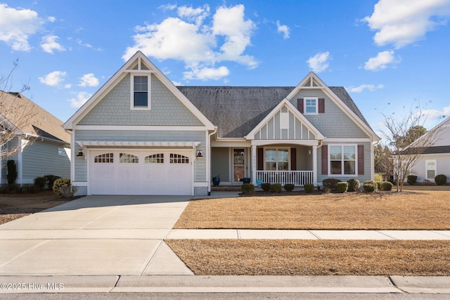 craftsman house with a porch and a garage