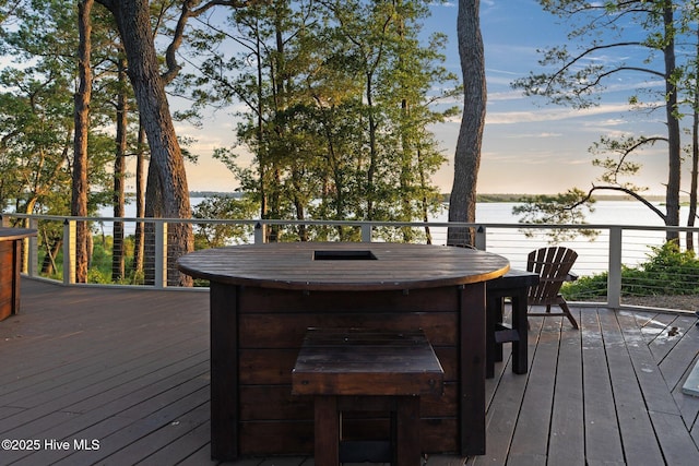 deck at dusk with a water view