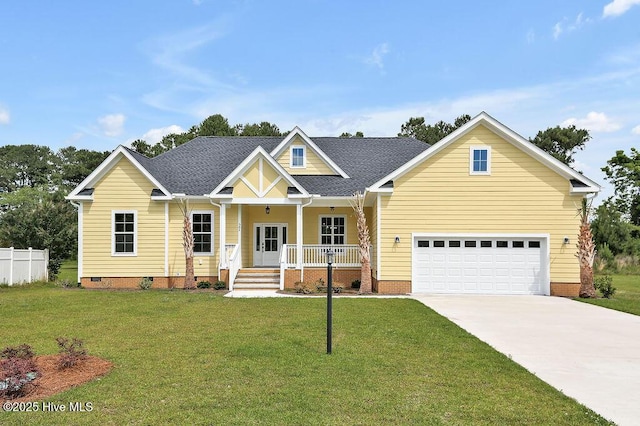 craftsman inspired home with concrete driveway, crawl space, covered porch, a front yard, and a garage