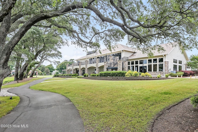 surrounding community with a lawn