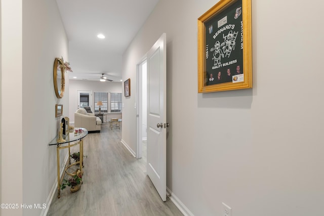 hallway featuring light hardwood / wood-style flooring