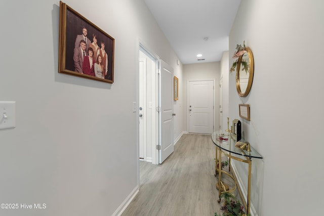 hallway featuring light wood-type flooring