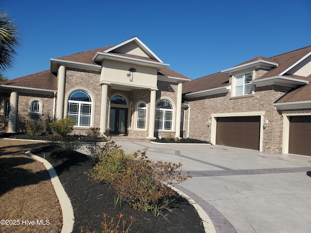 view of front of property featuring a garage