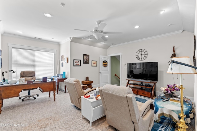 carpeted living room with ceiling fan and crown molding