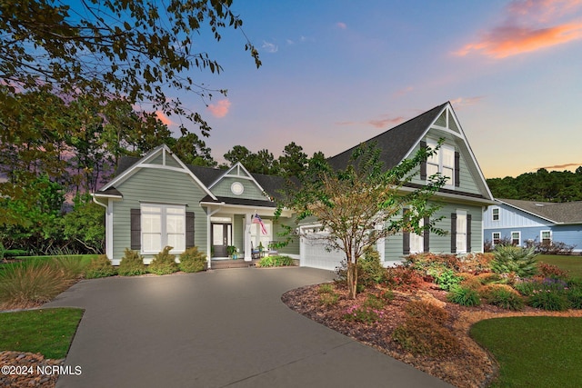 view of front of property with a garage