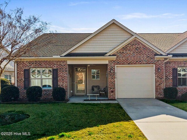 view of front of property with concrete driveway, brick siding, a shingled roof, and a garage
