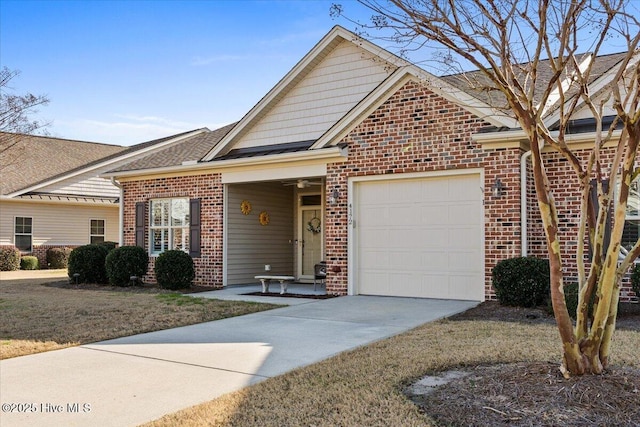 view of front facade with a garage and a front yard