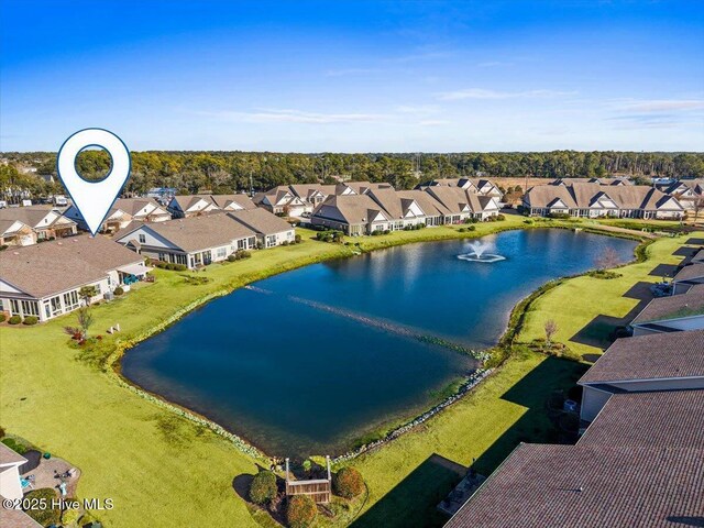 aerial view featuring a water view and a residential view