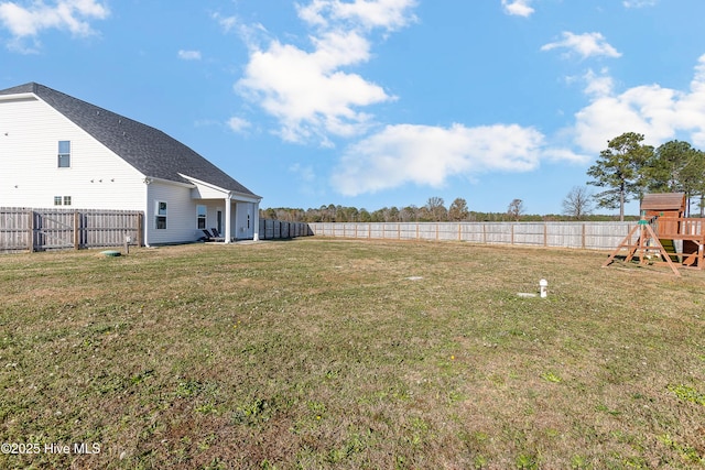 view of yard with a playground