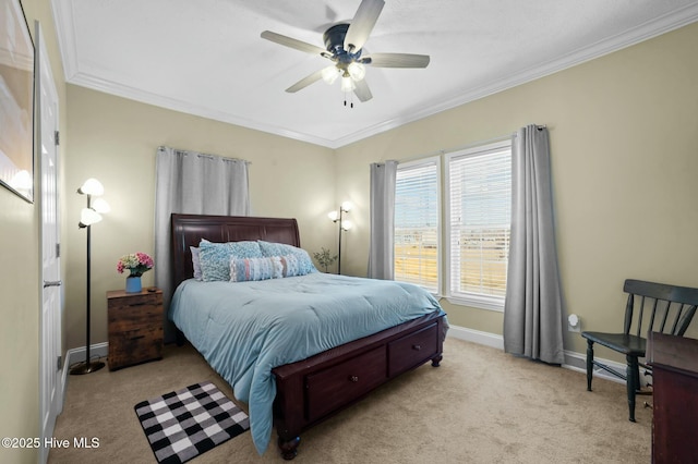 bedroom featuring crown molding, light carpet, and ceiling fan