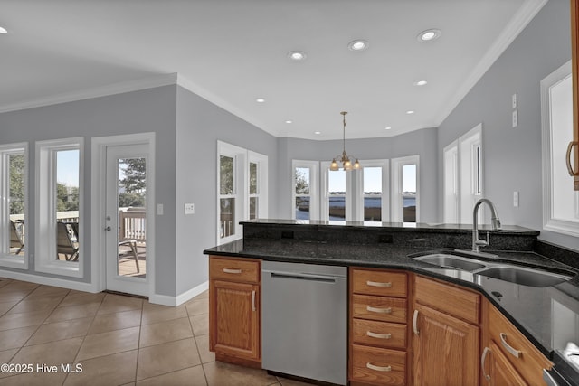 kitchen featuring ornamental molding, sink, dark stone countertops, dishwasher, and a chandelier