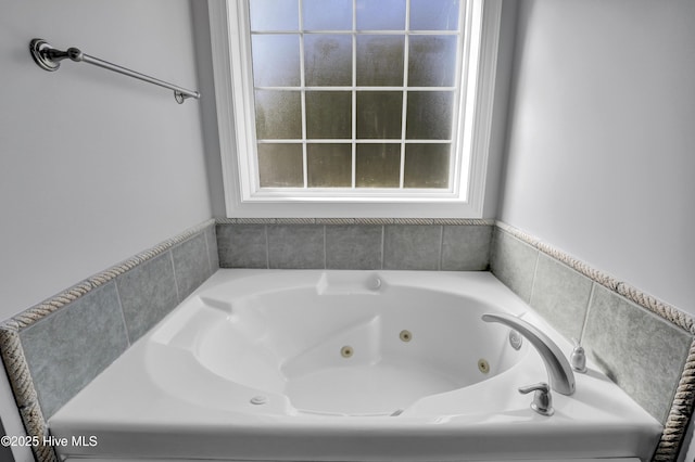 bathroom with a bathing tub