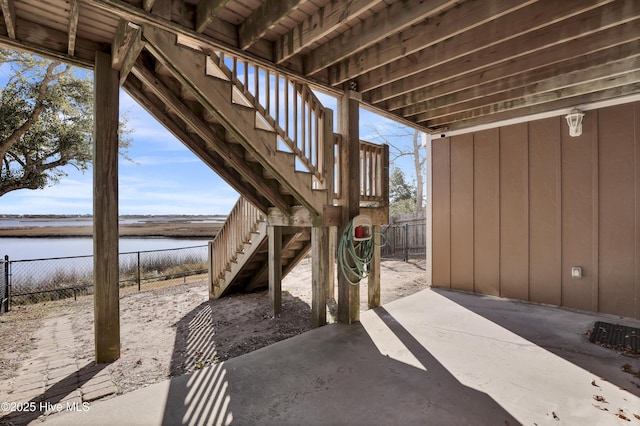 view of patio featuring a water view