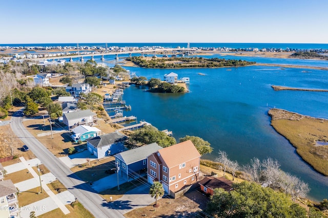 drone / aerial view featuring a water view