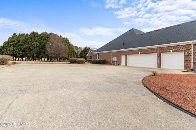 view of property exterior featuring a garage