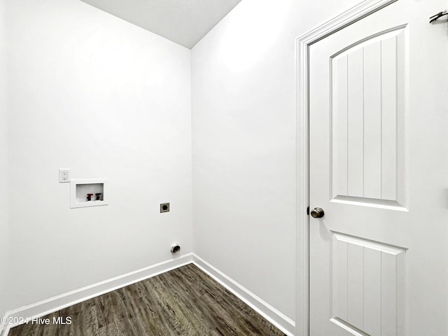 clothes washing area featuring electric dryer hookup, dark hardwood / wood-style flooring, and hookup for a washing machine