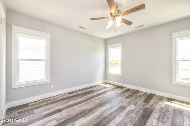 unfurnished room featuring wood-type flooring and ceiling fan