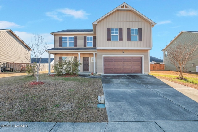 view of front facade featuring a garage and a front lawn