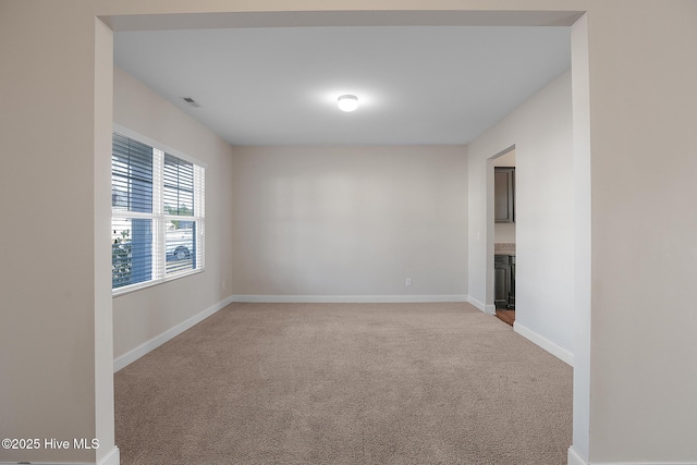 view of carpeted spare room