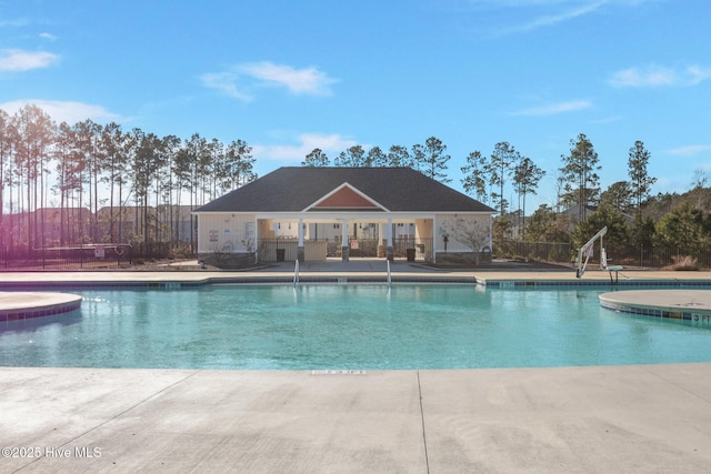 view of swimming pool featuring a patio area