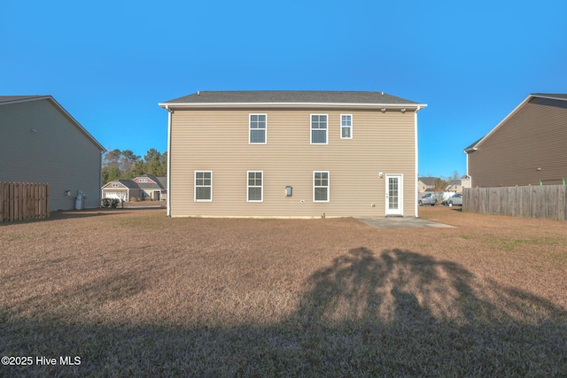 rear view of property featuring a patio