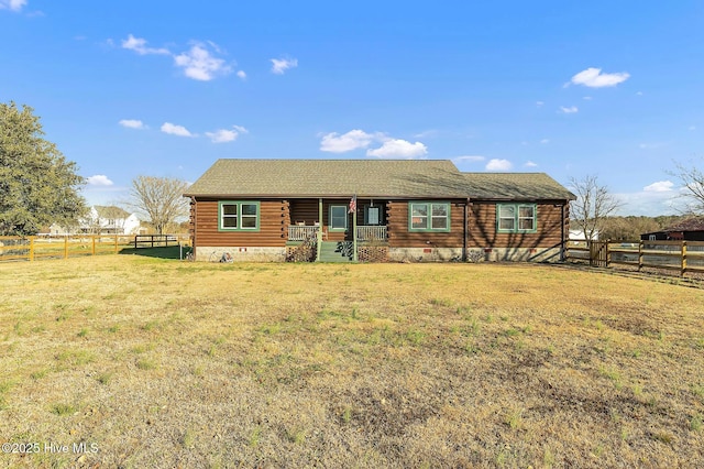 log cabin featuring a front lawn