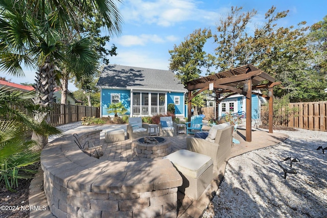 view of patio / terrace with a fire pit