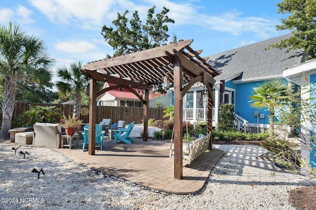 112 NE 28th St, Oak Island, NC 28465 - view of patio / terrace with a pergola and an outdoor living space