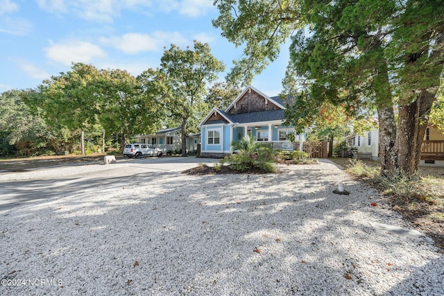 view of front of property featuring covered porch