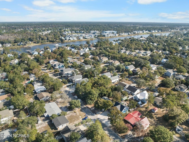 112 NE 28th St, Oak Island, NC 28465 - aerial view of property's location with a nearby body of water and nearby suburban area