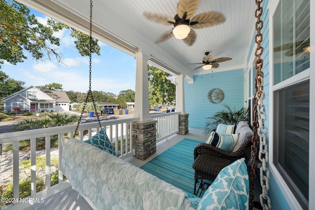 exterior space with ceiling fan and covered porch