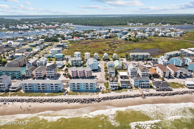 aerial view with a water view and a view of the beach