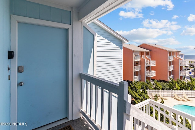 property entrance featuring a balcony