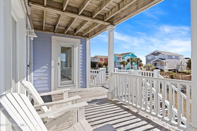 wooden balcony with a wooden deck