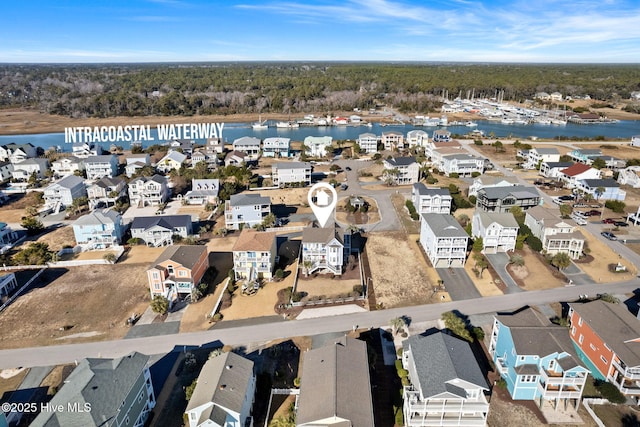 drone / aerial view with a water view