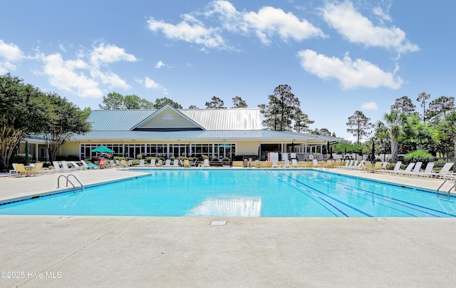 view of pool featuring a patio area