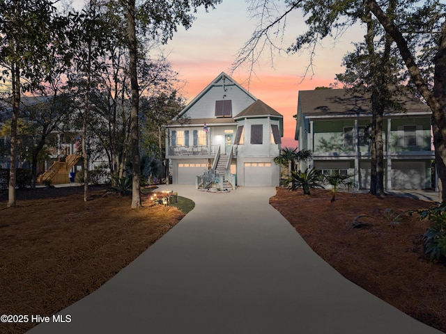 view of front of property with a garage and a porch