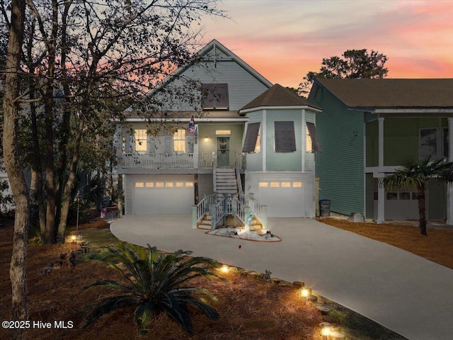 view of front of home featuring a garage and covered porch