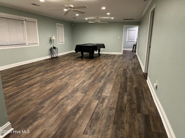 playroom featuring ornamental molding, dark wood-type flooring, and pool table