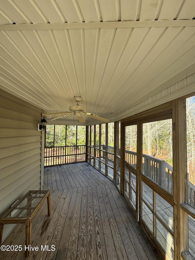 wooden deck with ceiling fan