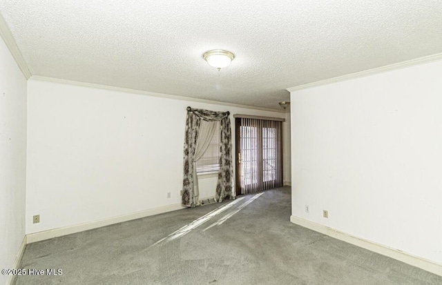 unfurnished room with crown molding, carpet floors, and a textured ceiling