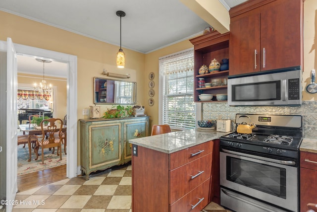 kitchen with tasteful backsplash, crown molding, and stainless steel appliances