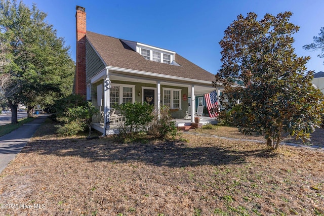 view of front of property featuring covered porch