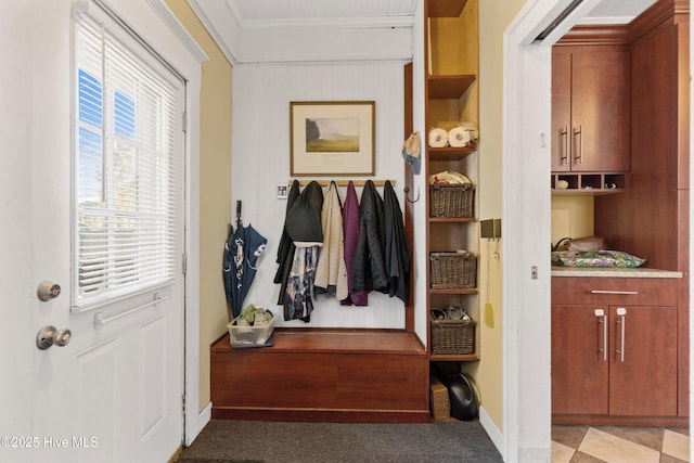 mudroom featuring ornamental molding