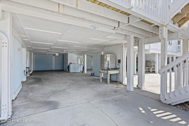 garage featuring a carport