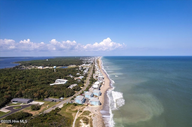 bird's eye view featuring a water view and a view of the beach