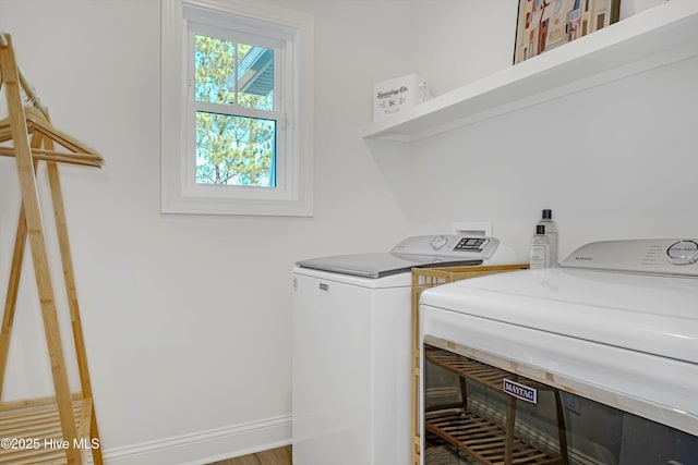 laundry area featuring independent washer and dryer